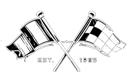 Crossed flags EST. 1985 logo